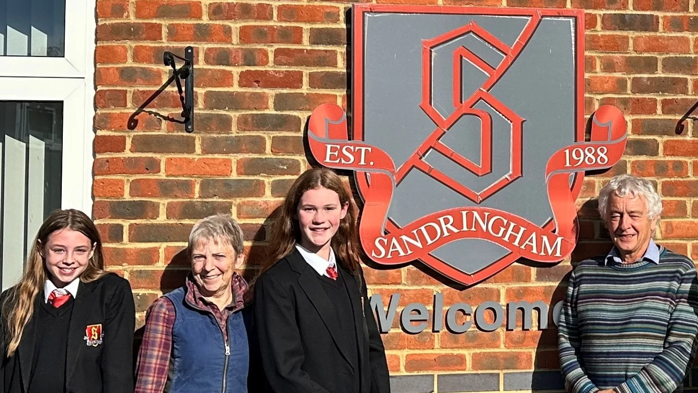 Councillors Allison Wren and Anthony Rowlands with Year 7 pupils outside Sandringham School in St Albans.