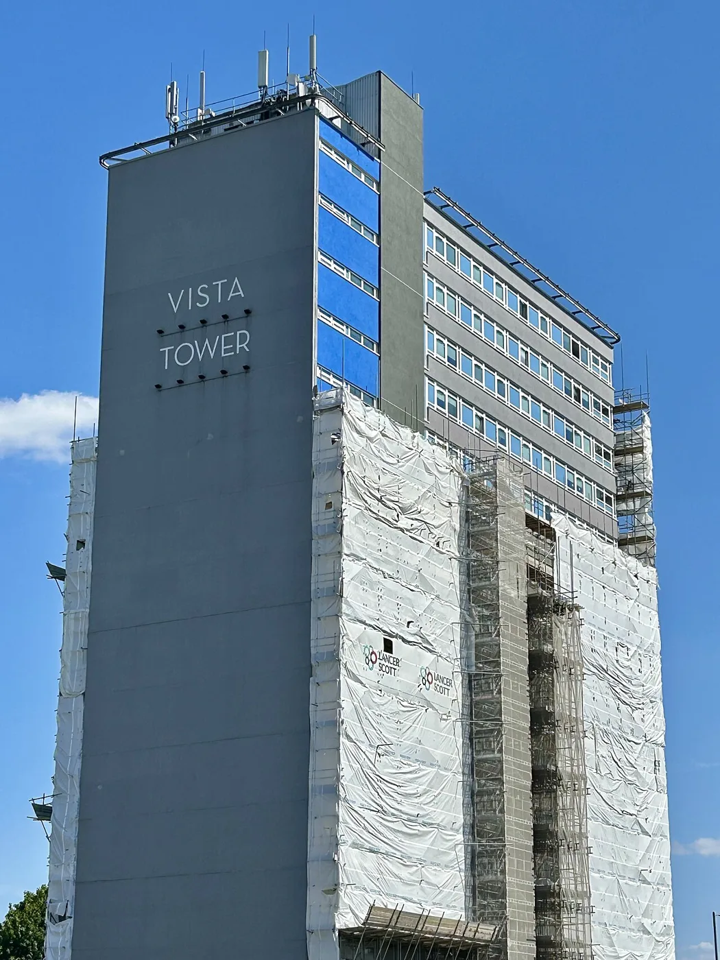 Vista Tower in Stevenage town centre, with scaffolding and sheeting on its lower floors