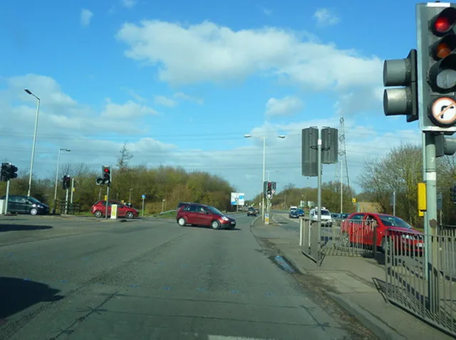 Traffic lights and a junction on Hitchin Road at the entrance to Sainsbury's, Stevenage